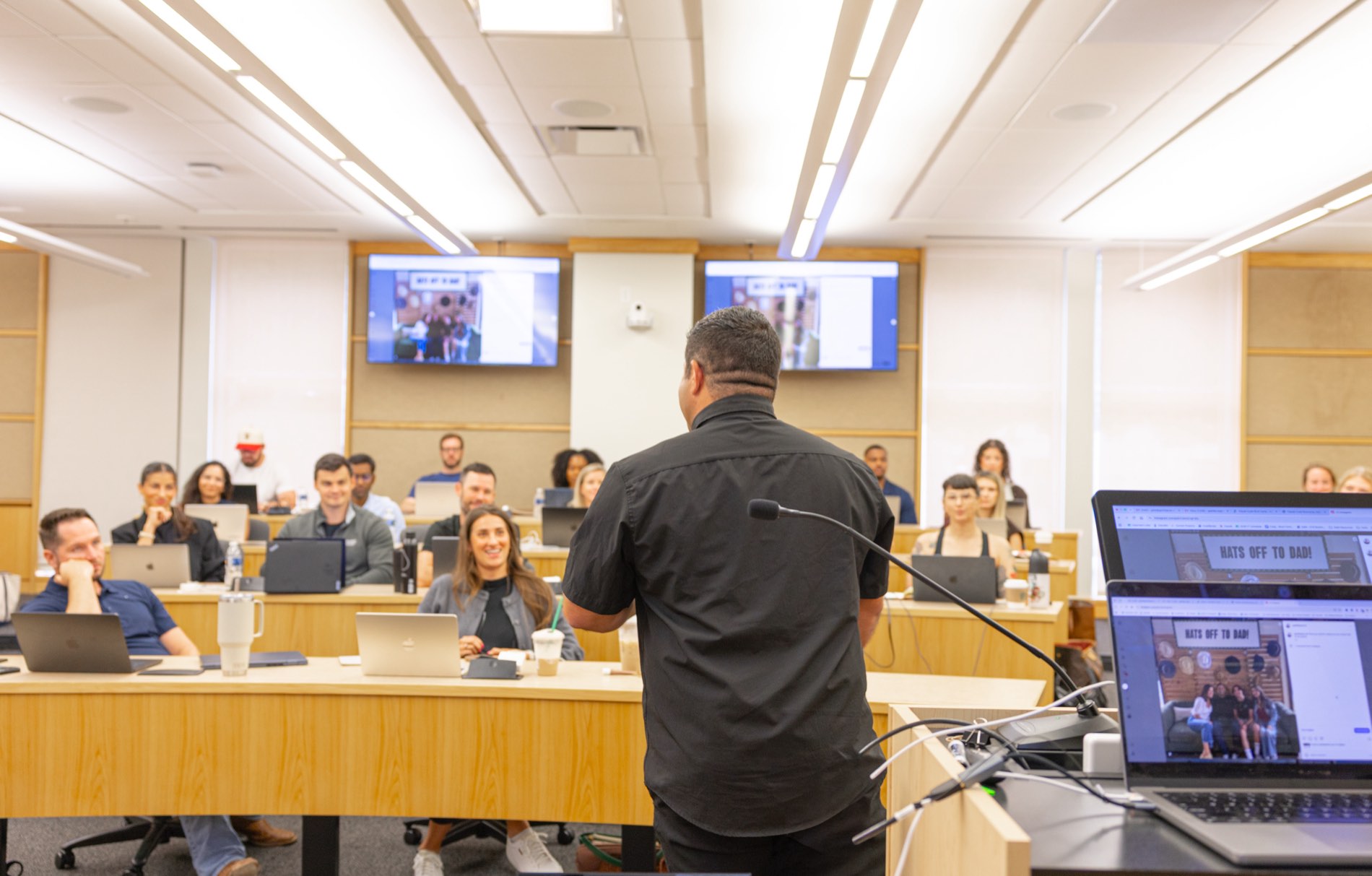 Galel Fajardo teaching a Claude Code workshop to a full lecture hall at Southern Methodist University in Dallas